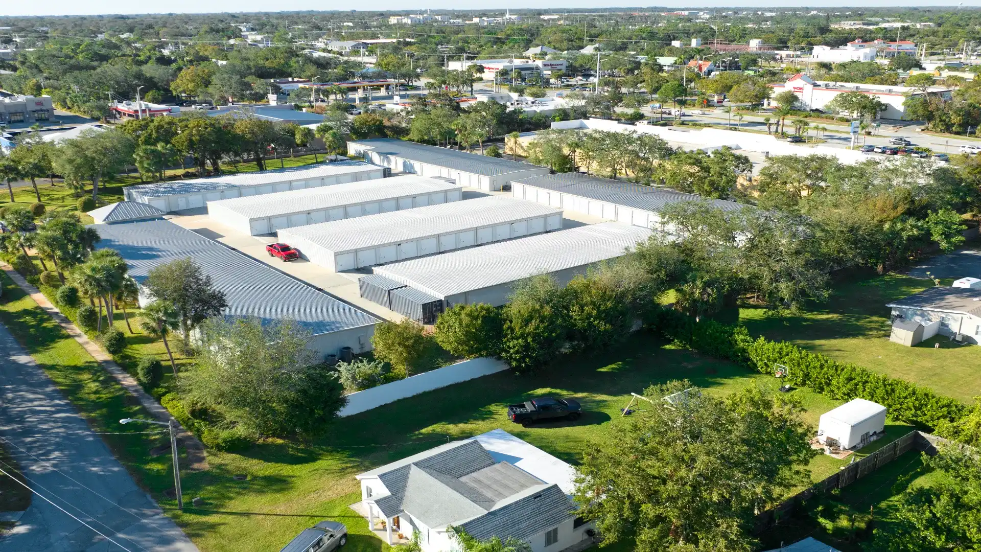 Aerial view of an Elevation Capital Group self-storage property in Vero Beach, Florida, surrounded by a residential neighborhood